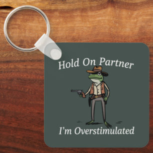 Hold On Partner I'm Overstimulated Cowboy Frog Keychain