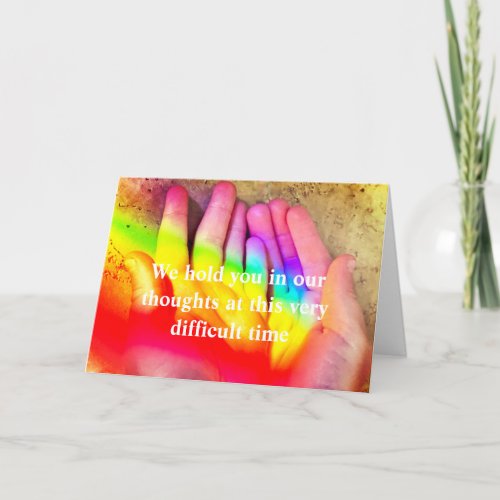 Holding a Rainbow Card