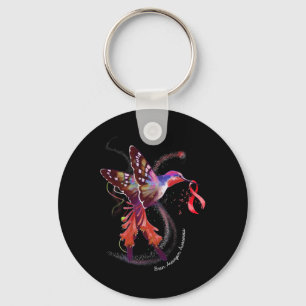 Holding Burgundy Ribbon Brain Aneurysm Awareness Keychain
