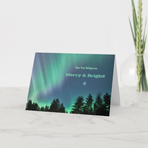 Holiday card with colorful Northern Lights Aurora