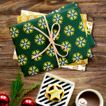 Holiday gold foil white green snowflake pattern wrapping paper sheets<br><div class="desc">A fun, playful, gold and white snowflake graphic pattern in three graphic sizes, on a rich dark green and faux gold foil textured backgrounds, helps you usher in the holiday season of Christmas and Hanukkah. Feel the warmth and joy of the holidays whenever you use this stunning, chic, modern, holiday...</div>