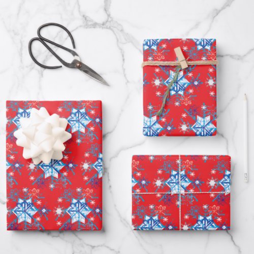Holiday red and blue snowflakes and stars wrapping paper sheets