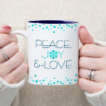 Holiday Simple Modern Snowflake Peace Joy Love Two-Tone Coffee Mug<br><div class="desc">“Peace, joy & love.” A fun, playful, snowflake illustration and modern turquoise and dark blue typography on a white background help you usher in the holiday season. Turquoise confetti dots frame complete the look. Feel the warmth and joy of the holidays whenever you drink out of this stunning, colorful holiday...</div>