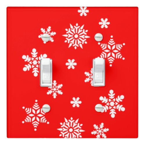 Holiday snowflakes on red background light switch cover