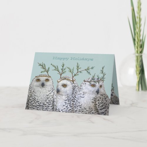 Holiday snowy owls on aqua card