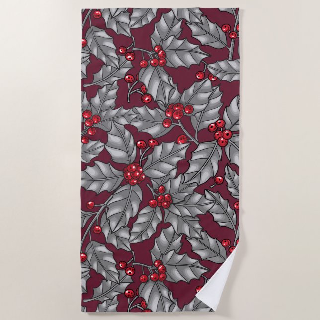 Holly berry, gray leaves on dark red beach towel (Front)