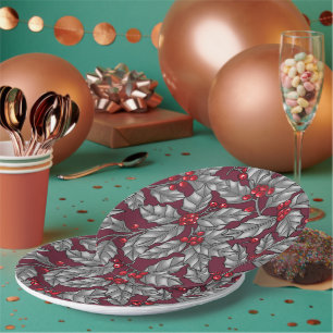 Holly berry, gray leaves on dark red paper plates