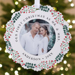 Holly Berry Wreath First Christmas Wedding Photo Ornament Card<br><div class="desc">Send festive holiday greetings to your friends and family with a special Christmas keepsake celebrating your first Christmas as a married couple. The paper ornament card features your favorite wedding photo encircled by a wreath of holly berries, green eucalyptus, and white flowers. The design displays the phrase "Our First Christmas...</div>