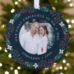 Holly Berry Wreath First Christmas Wedding Photo Ornament Card<br><div class="desc">Send festive holiday greetings to your friends and family with a special Christmas keepsake celebrating your first Christmas as a married couple. The paper ornament card features your favorite wedding photo encircled by a wreath of holly berries, green eucalyptus, and white flowers. The design displays the phrase "Our First Christmas...</div>