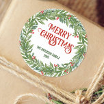 Holly Wreath Family Name Christmas White Classic Round Sticker<br><div class="desc">Add a touch of festive charm to your presents with this white round sticker featuring a classic Christmas wreath. Customize it with your family's name and "Merry Christmas" message for a warm and welcoming holiday vibe.</div>