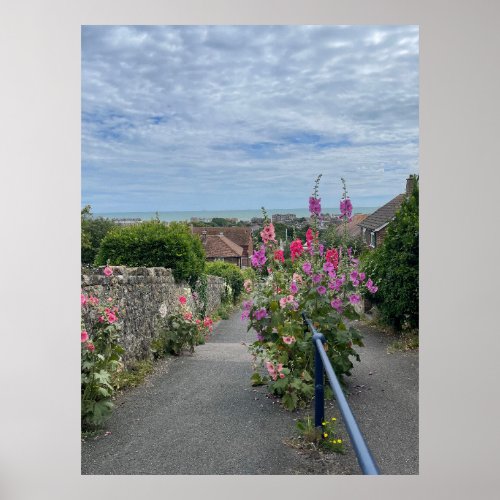 Hollyhocks alongside St Leonards Church wall Hythe Poster