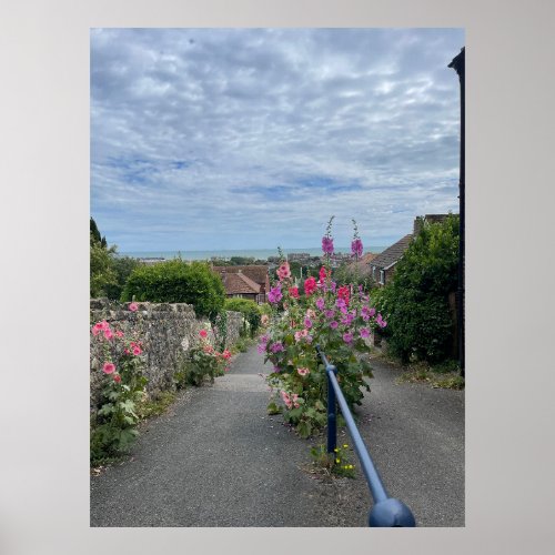 Hollyhocks alongside St Leonards Church wall Hythe Poster