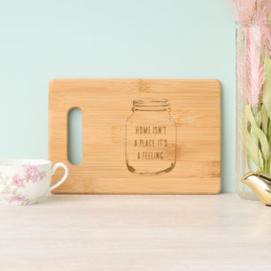 Home isn't a place it's a feeling custom wood engraved cutting board
