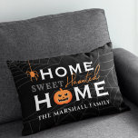 Home Sweet Haunted Home Personalized Halloween Accent Pillow<br><div class="desc">Welcome your guests with this spooky fun personalized Halloween lumbar throw pillow. The stylish typography design features "Home Sweet Haunted Home" wording with custom text for your family name and accents of a scary jack-o-lantern pumpkin, creepy dangling spider, and spider web background. Includes a black, gray, white, and orange color...</div>