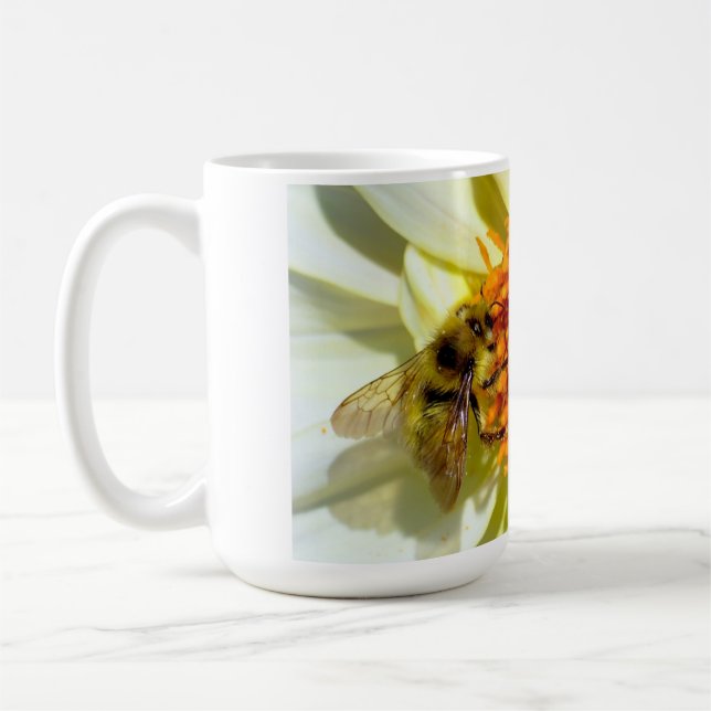 Honey bee and flower coffee mug. coffee mug (Left)