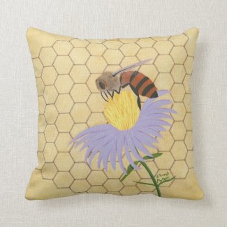 Honey bee on a flower honeycomb background pillow