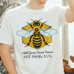 Honeybee Honeycomb Bee Farm Apiary Personalized T-Shirt<br><div class="desc">This honeybee t-shirt has a large bee over a light, bright honeycomb background. The yellow and black bee has white-blue wings that spread out like it's ready to fly. The background is a pretty golden beehive honeycomb shape. Use the template to add any text you like, such as your bee...</div>
