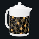 Honeycomb Pattern Teapot<br><div class="desc">This contemporary design features a geometric gold color beehive pattern,  bumblebees,  and a black color background.</div>