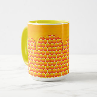 Honeycomb with dripping honey mug