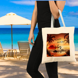 Honeymoon vibes tropical sunset beach moon tote bag