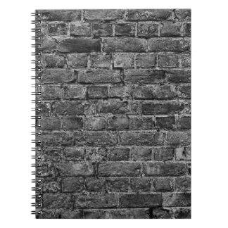 horizontal part of black painted brick wallwall,br notebook