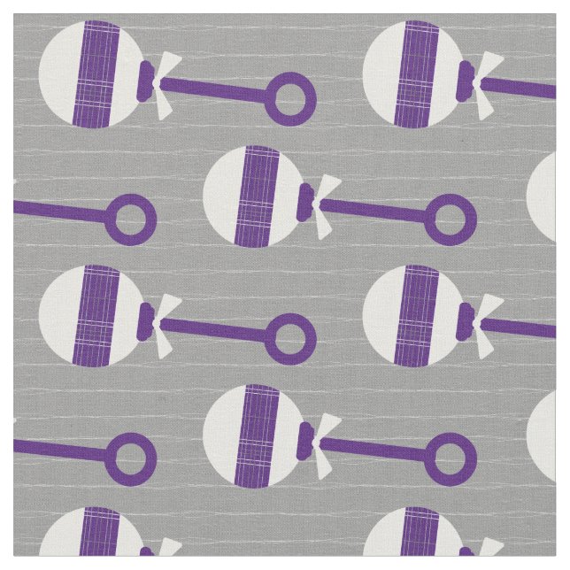 Horned Frog Purple Plaid Baby Rattle on Gray Fabric (Close Up)