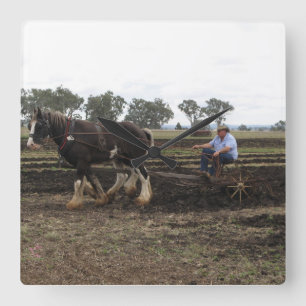 horse drawn plow clock