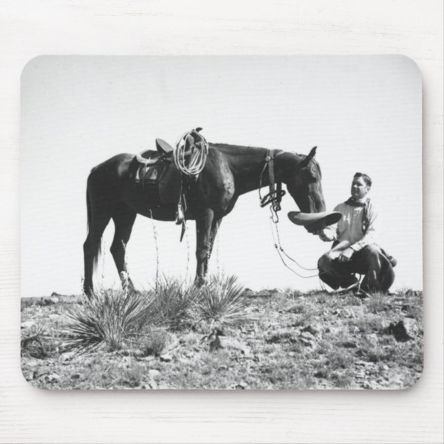 Horse eating from a cowboy's hat. mouse pad (Front)