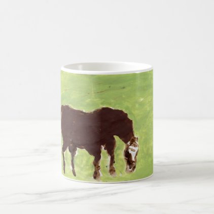 Horse grazing on green background mug