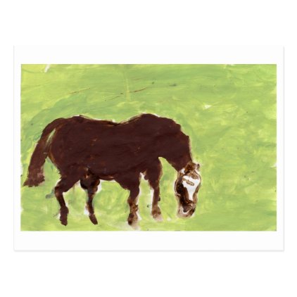 Horse grazing on green background postcard