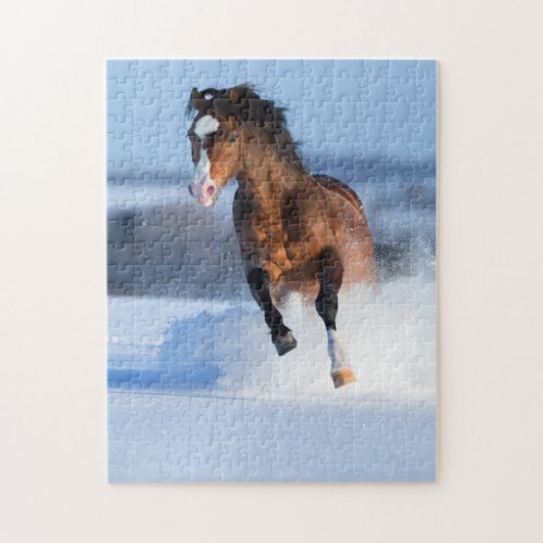 Horse running across the field in winter jigsaw puzzle
