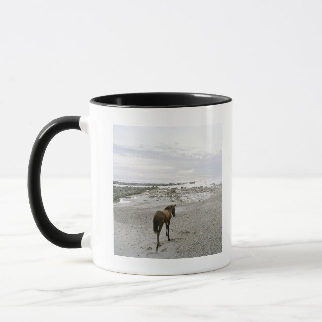 Horse walking on the beach mug (Left)