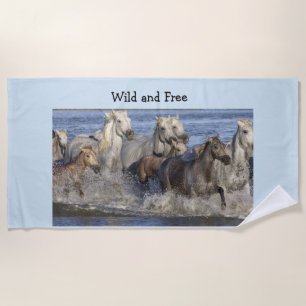 Horses galloping in the water beach towel