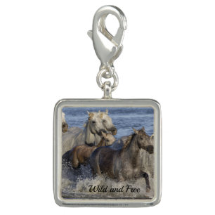 Horses galloping in the water charm