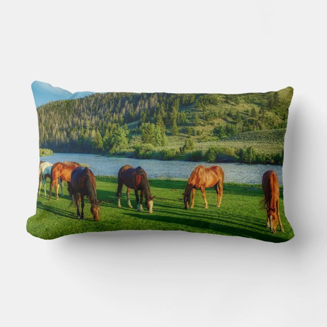 Horses Grazing Near A River And Mountain  Lumbar Pillow (Front)