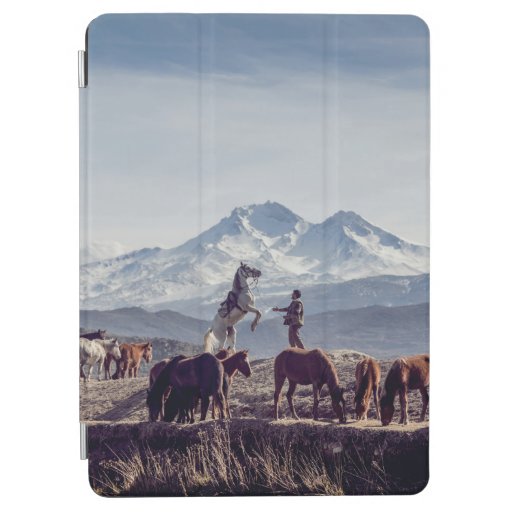 HORSES IN BROWN OPEN FIELD VIEWING MOUNTAIN AT DAY iPad AIR COVER