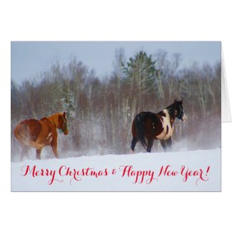 Horses in the snow Christmas and New Year&#39;s card
