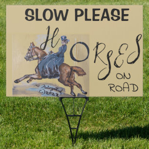HORSES ON ROAD SIGN