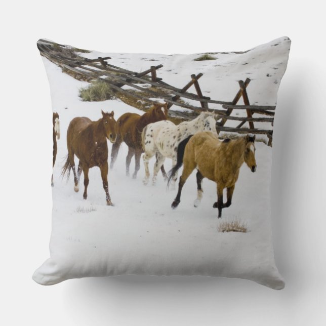 Horses Running in Snow Throw Pillow (Front)