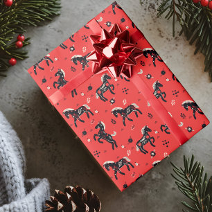 Horses with floral ornament on a red background wrapping paper