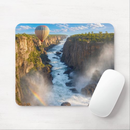 Hot Air Balloon Hovering Over Canyon Gorge Mouse Pad