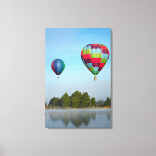 Hot air balloons over a lake, NZ Canvas Print