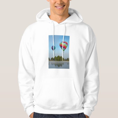 Hot air balloons over a lake  NZ Hoodie