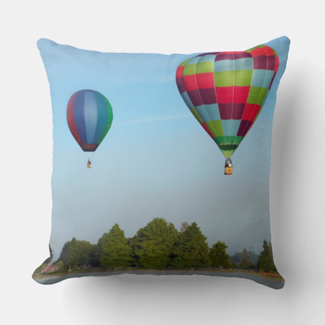 Hot air balloons over a lake,  NZ Throw Pillow (Front)