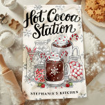 Hot Cocoa Station Personalized Christmas Kitchen Towel<br><div class="desc">Warm up your kitchen with this delightful personalized Christmas kitchen towel featuring a festive hot cocoa station design. Perfect for adding a cozy touch to your holiday decor, this towel showcases mugs of hot cocoa with candy canes, marshmallows, and festive treats. Customize it with your name or special message to...</div>