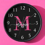 Hot Pink Black Modern Script Girly Monogram Name  Clock<br><div class="desc">Make a bold statement in your space with our Hot Pink Modern Script Girly Monogram Name Large Clock! Featuring a vibrant hot pink design and personalized with your name in an elegant modern script, this clock adds a stylish and personal touch to any room. Perfect for bedrooms, offices, or living...</div>