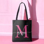 Hot Pink Black Modern Script Girly Monogram Name Tote Bag<br><div class="desc">Carry your essentials in style with our Hot Pink Modern Script Girly Monogram Name Tote Bag! Featuring a bold hot pink design, this tote is personalized with your name in a chic modern script for a trendy, custom look. Perfect for shopping, school, or everyday use, it offers ample space and...</div>