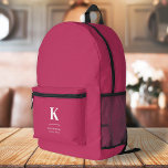 Hot Pink Feminine Girly Typographic Monogram Printed Backpack<br><div class="desc">A minimalist vertical design in an elegant style with a hot pink feature color and large typographic initial monogram. The text can easily be customized for a design as unique as you are!</div>