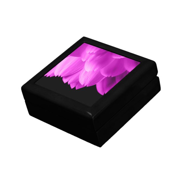 Hot pink flower petals on black gift box (Side)