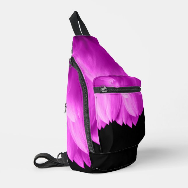 Hot pink flower petals on black sling bag (Left Corner)